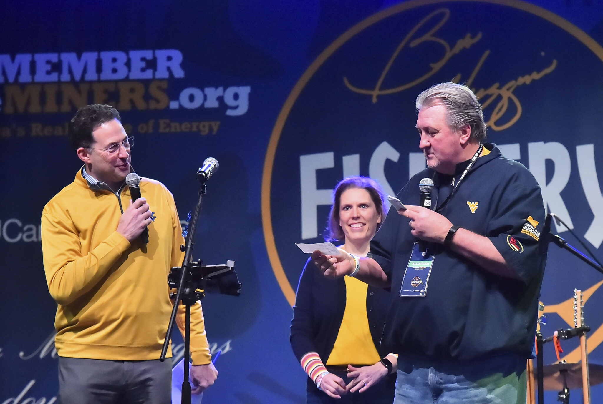 Cancer survivor pays it forward at Bob Huggins Fish Fry Friday evening