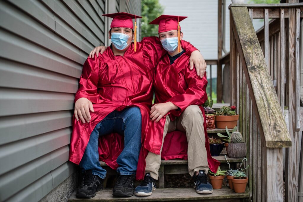 graduates with masks