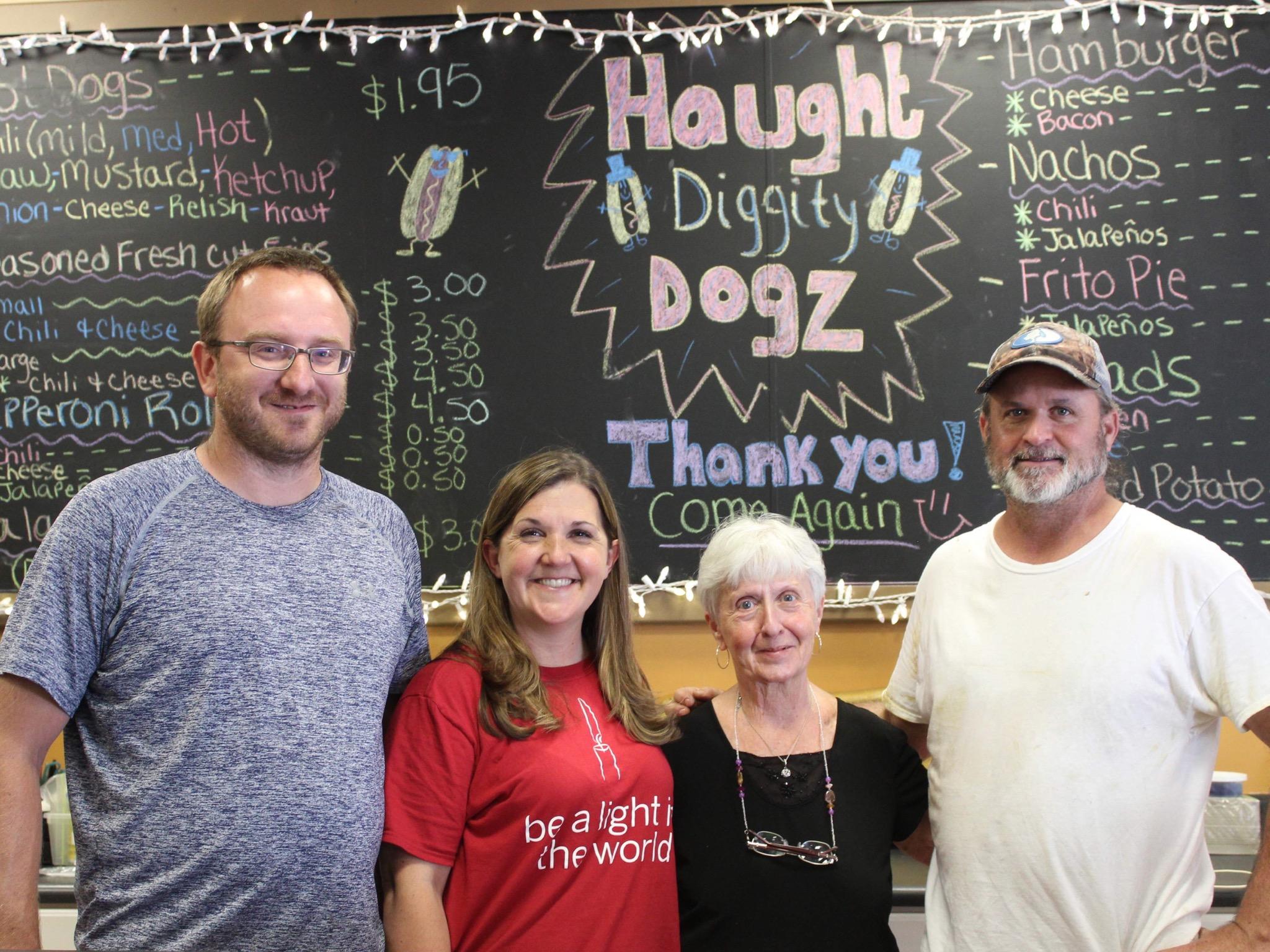 Trinity Christian School board members with owners of Haught Diggity Dogz