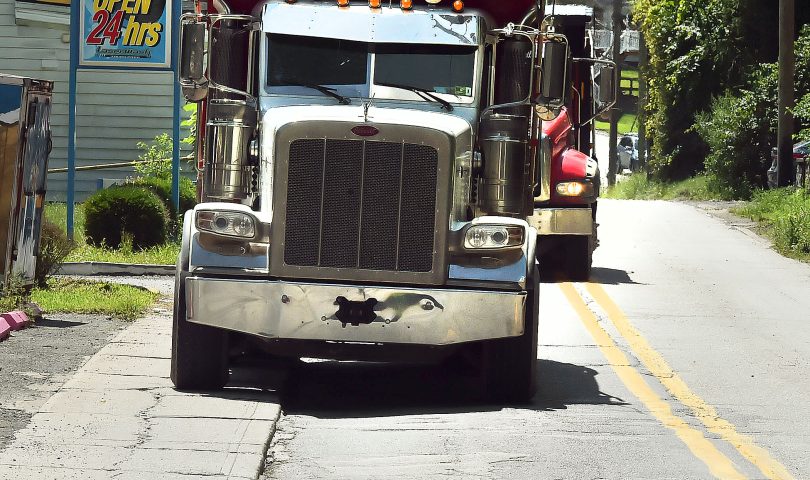 A 2023 file photo of a heavy truck driving on the sidewalk along East Brockway Avenue.