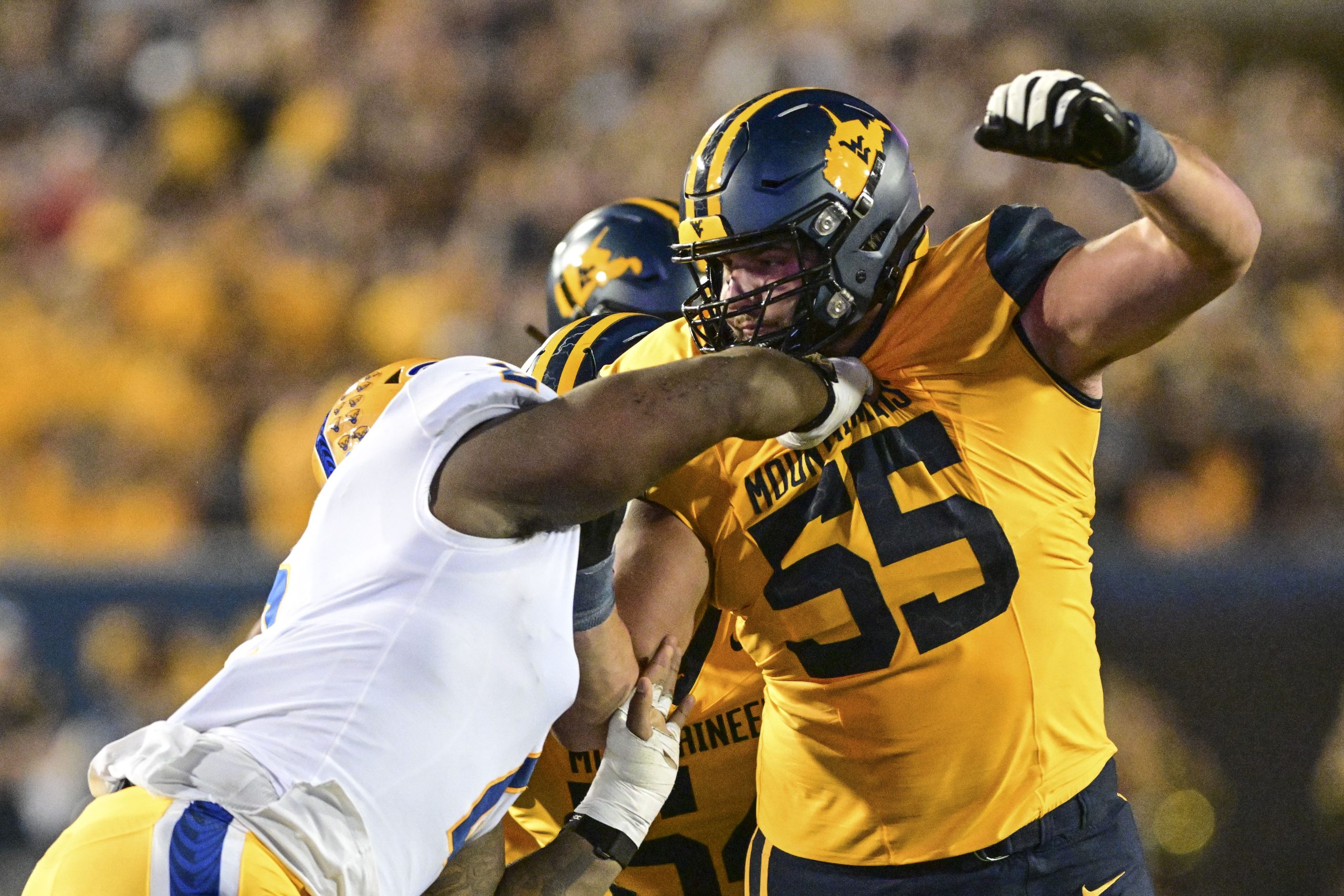 Strong offensive line allowing WVU to run the ball at will Dominion Post