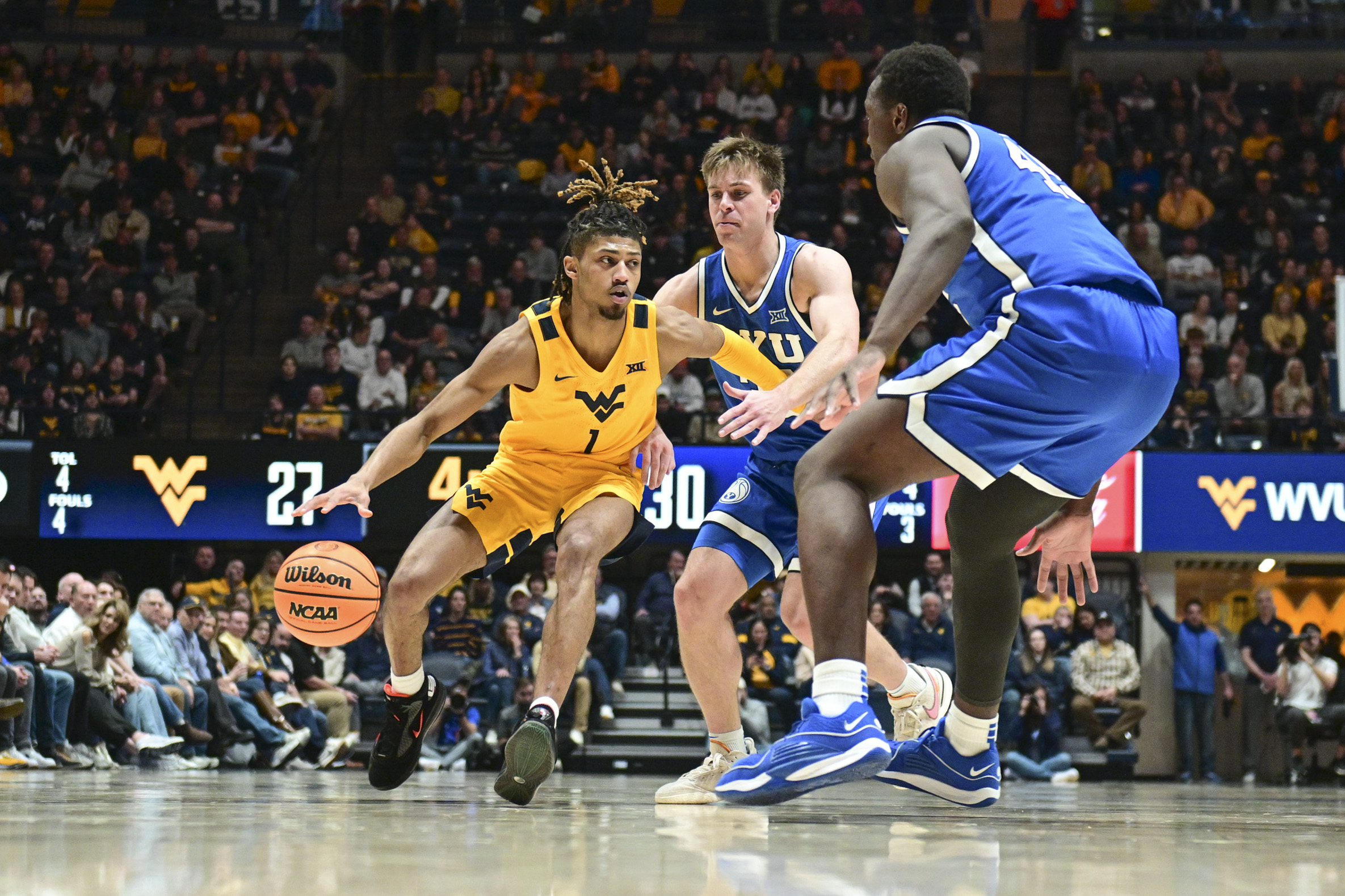 BYU tops WVU in first trip to the Coliseum, 8673 Dominion Post