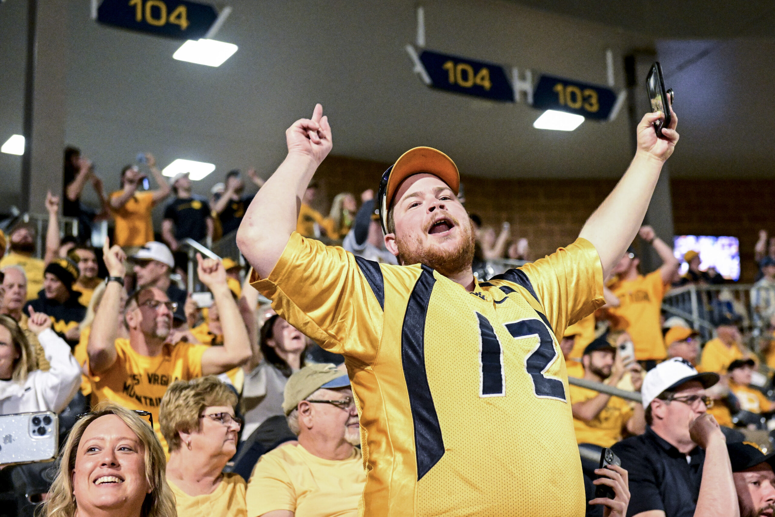 Attendance record set, as No. 22 WVU takes down rival Pitt, 63