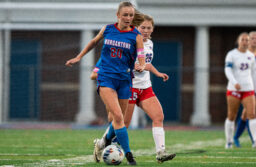 Morgantown's LIllian Staples (20) rushes down center field with the ball against Wheeling Park in sectionals.